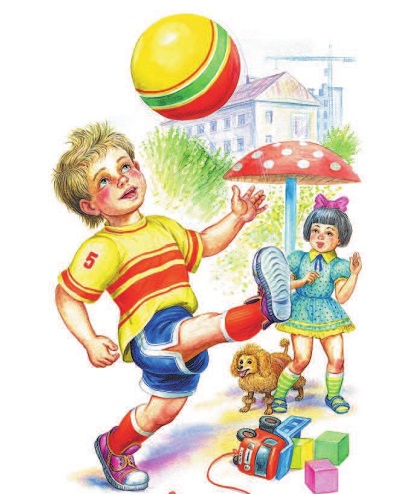 Мальчик играет с мячом